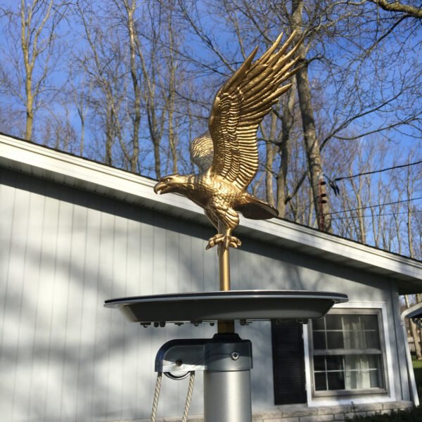 Shown with Eagle ornament to illustrate how the light is installed on flag pole. Eagle ornament not included.