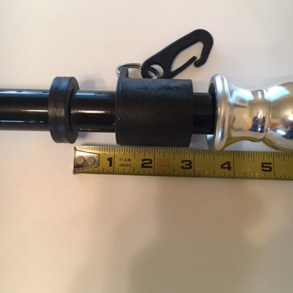 Proper installation of Never-Furl collar at top of pole.