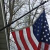 Showing the proper slack in the flag on the pole when Never-Furl is properly installed.