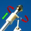 This image shows the White Never Furl installed on pole and how it rotates 360 degrees and up and down.