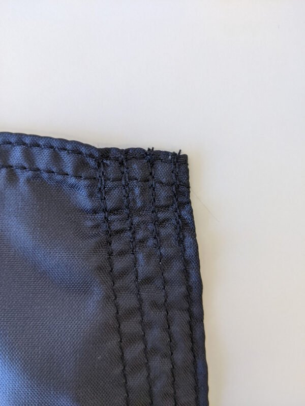 Top edge and fly end of Space Force Flag showing superior stitching. Made in USA