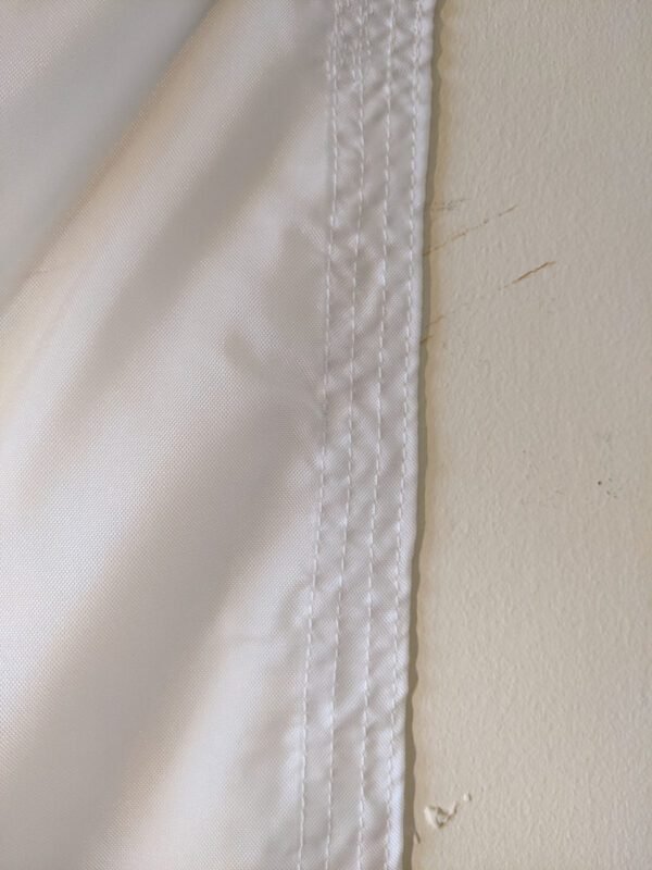 Official Polish Flag showing fly end with reinforced corners and 4 rows of stitching for extra strength. Made in USA