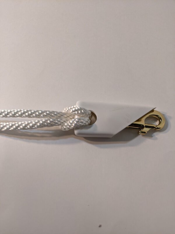 5/16" White Braided Polyester Halyard shown with 3.5" Bright Brass Plated Snap and white snap cover (brass snap and snap cover sold separately) Made in USA