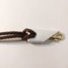 5/16" Bronze Braided Polyester Halyard shown with 3.5" Bright Brass Plated Snap and white snap cover (brass snap and snap cover sold separately) Made in USA