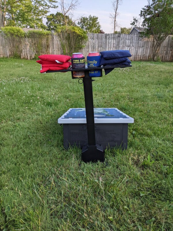 Cornhole Caddy with LED Lights back of caddy with bags and drinks with game board
