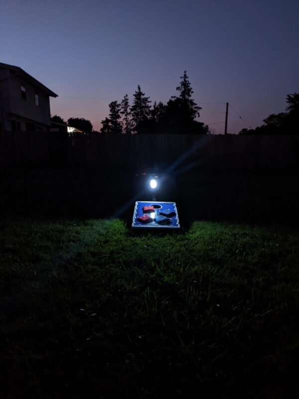 Cornhole Caddy with LED Lights pictured from 21 feet away with bags on board