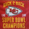 Clos up of Back 2 back Super Bowl Champions flag