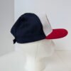 side view of the United we stand patriotic hat made in USA